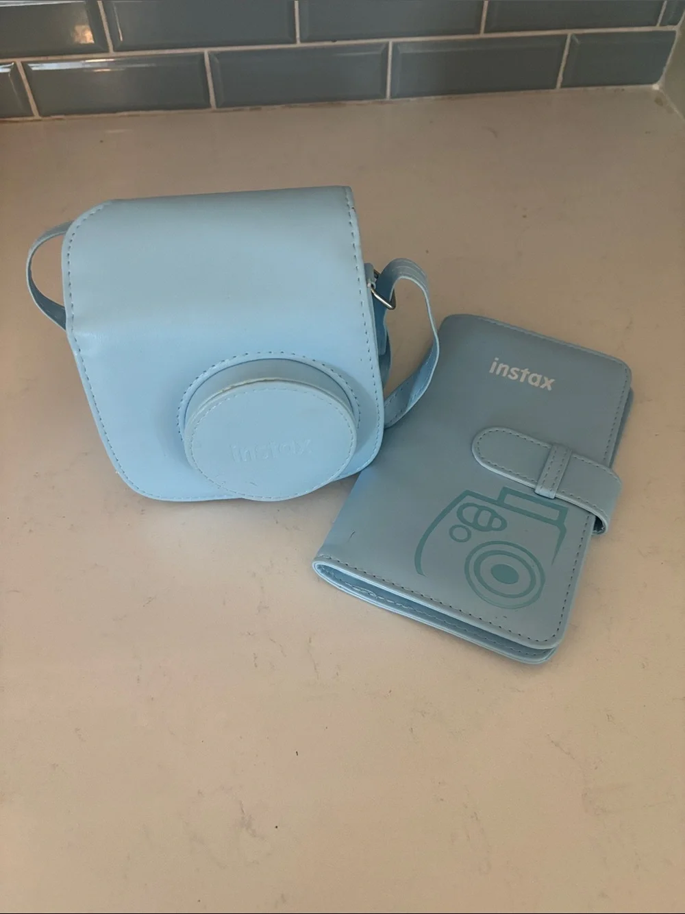 Fujifilm Instax Mini Camera with Light Blue Case and Album